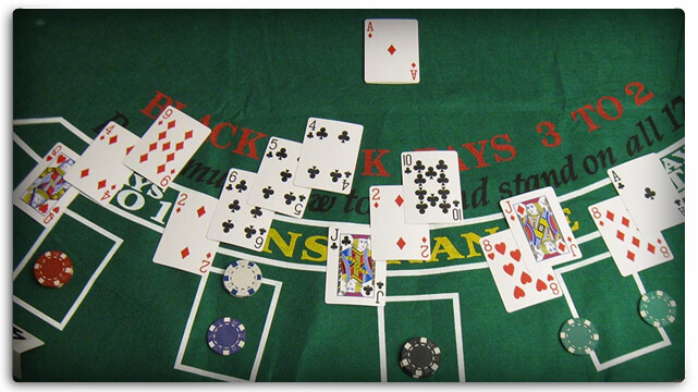 Blackjack Table With Several Different Hands